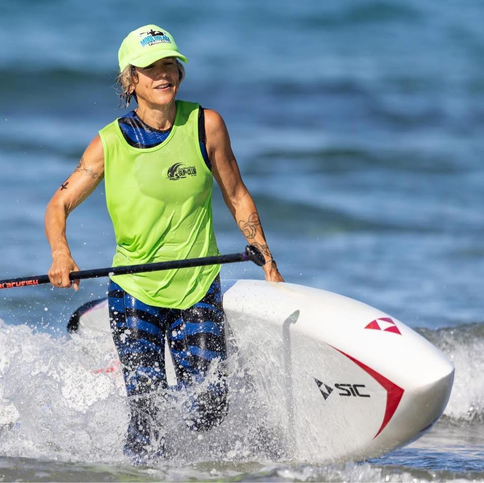 Pollyanna Darling with paddleboard Pollyanna and paddleboard